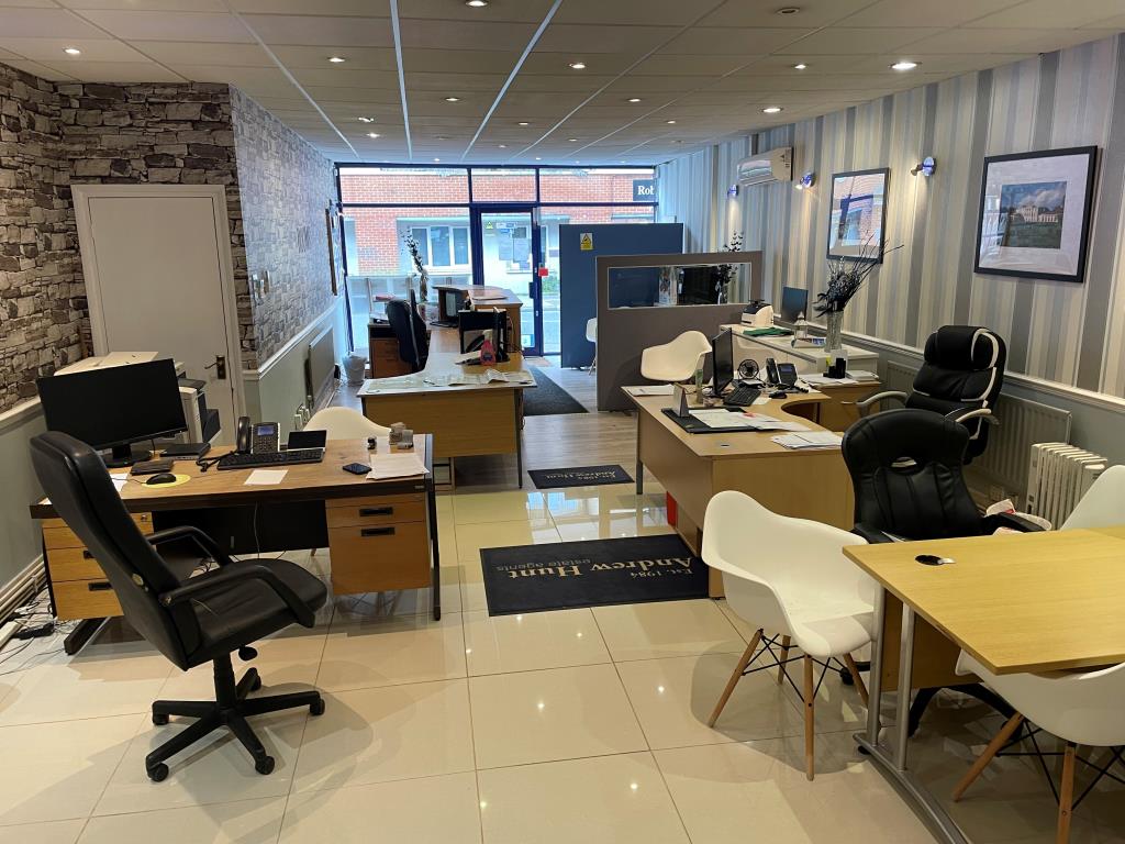 Lot: 79 - FREEHOLD SHOP AND FLAT WITH UPPER PARTS - view of ground floor retail unit from rear